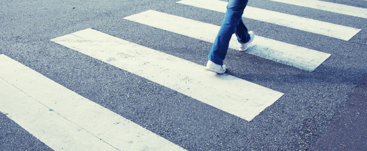 Pedestrian crossing the street of California